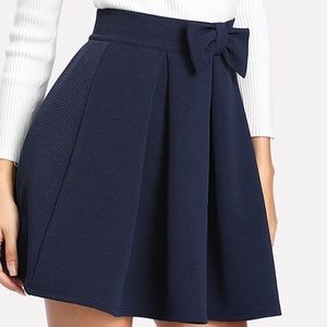 Navy blue skirt with bow